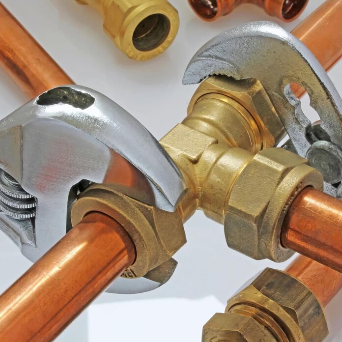 Gas Fitter At Work